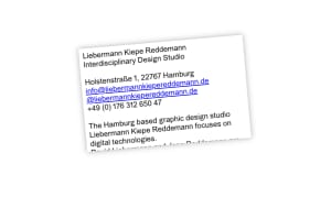 The site is opened in a minimized window almost looking like a business card.