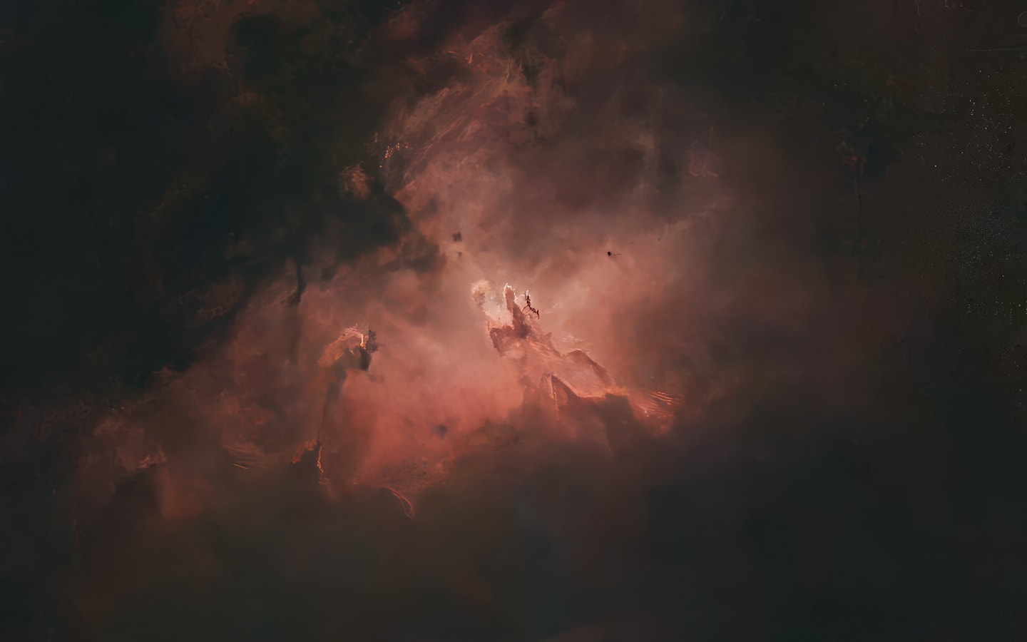 The Pillars of Creation: dark columns of gas and dust lit red and white at the heart of the Eagle Nebula
