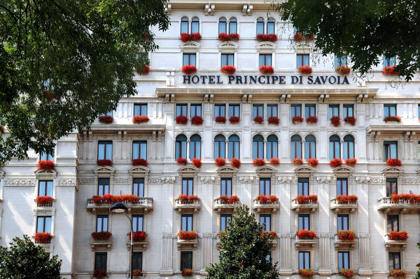 The flower-decked façade of the Hotel Principe di Savoia, the Dorchester Collection palace hotel in Milan, which will close for renovation on 1 January 2027