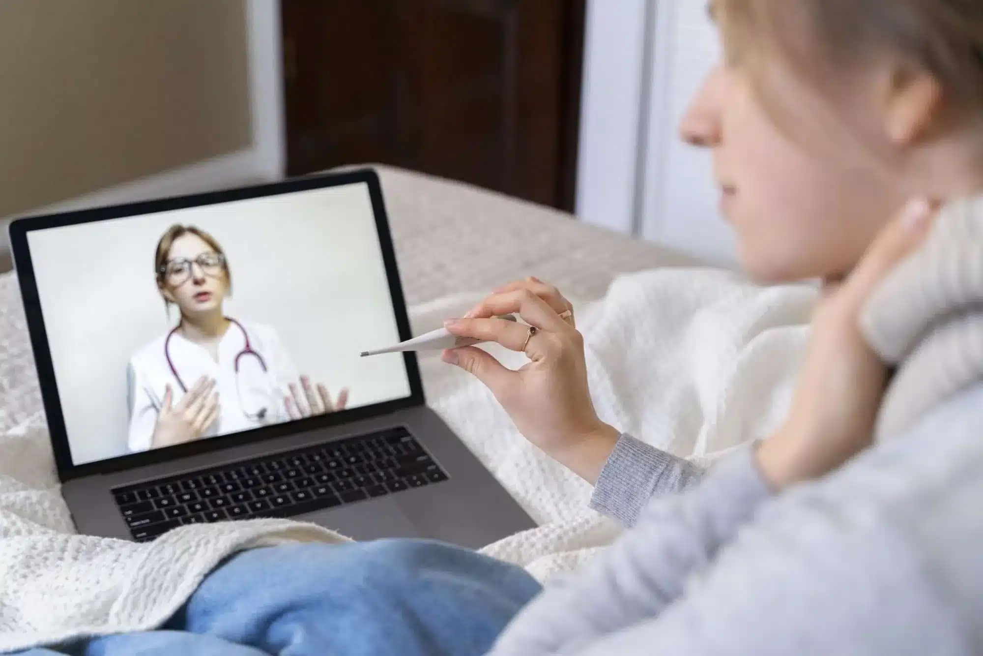 A woman is having a telehealth consultation for women’s healthcare.