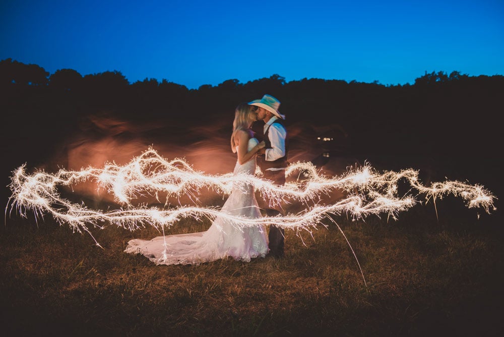 late night sparkler couple portrait