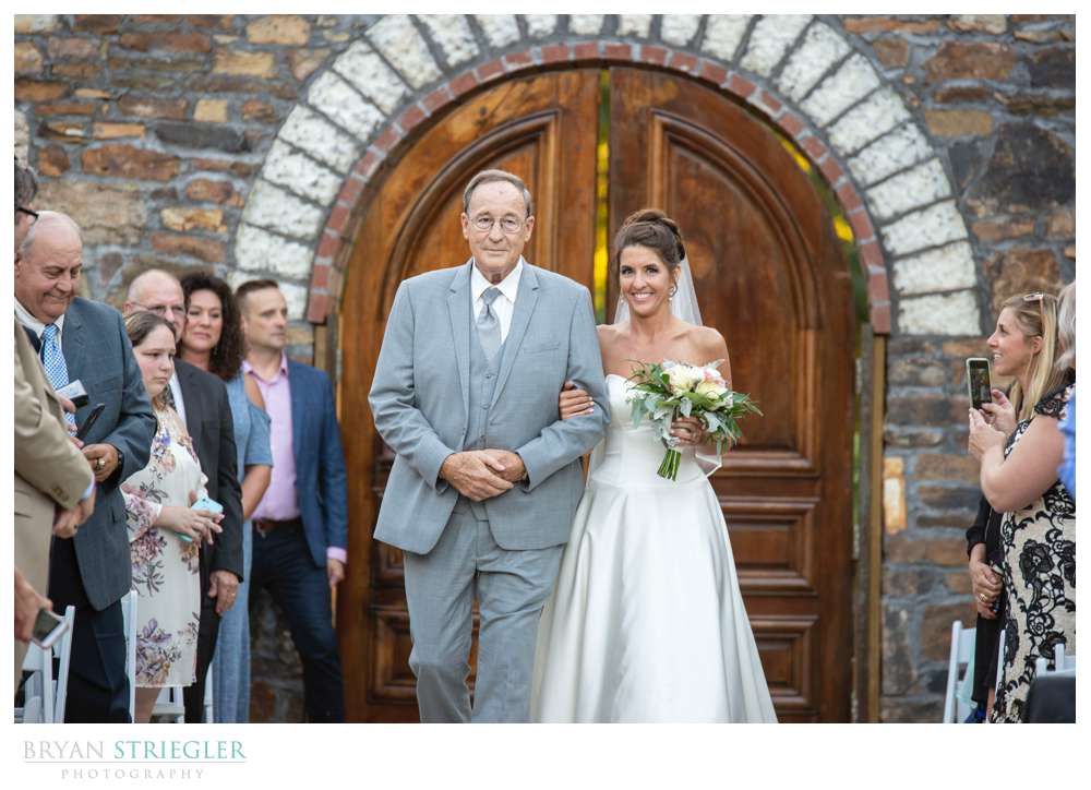 bride walking slowly down the aisle