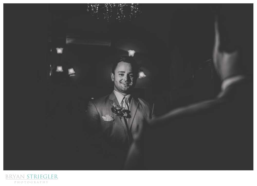 dramatic bw of groom