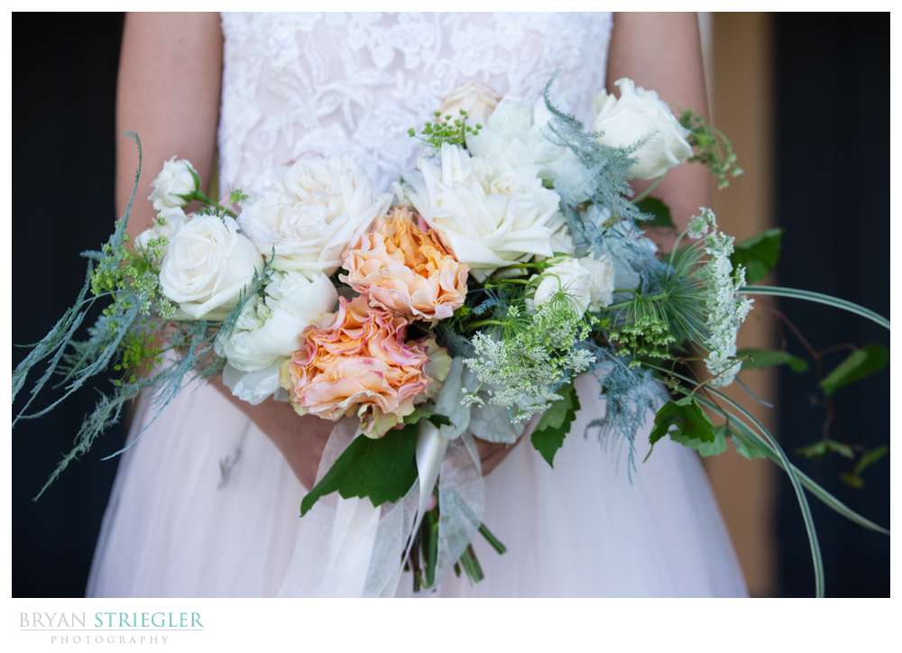 bride holding wedding bouquet