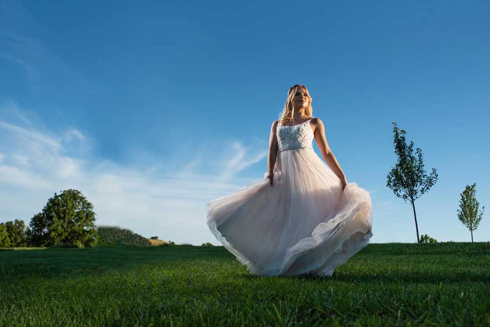 bride twirling in dress