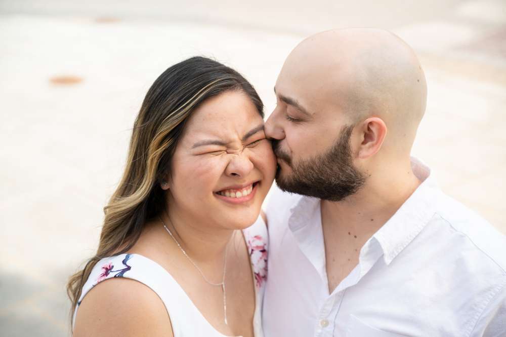 kissing her on the cheek