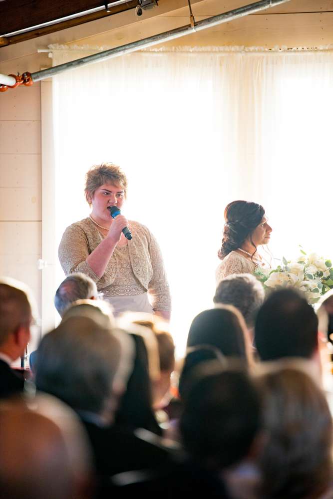 sister singing at wedding