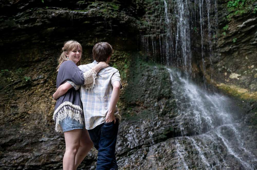 couple looking at waterfall