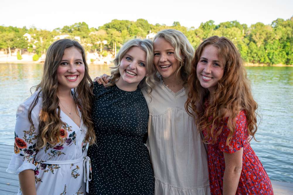 group of friends there for wedding proposal