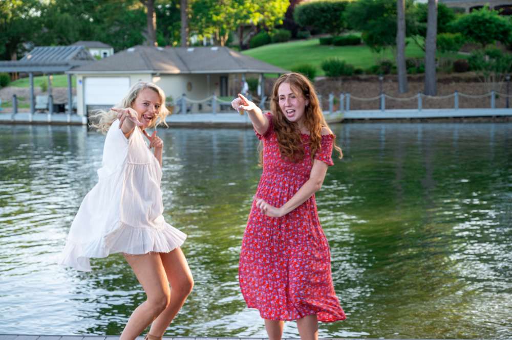 friends dancing after proposal