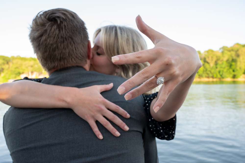 girl showing off engagement ring after proposal