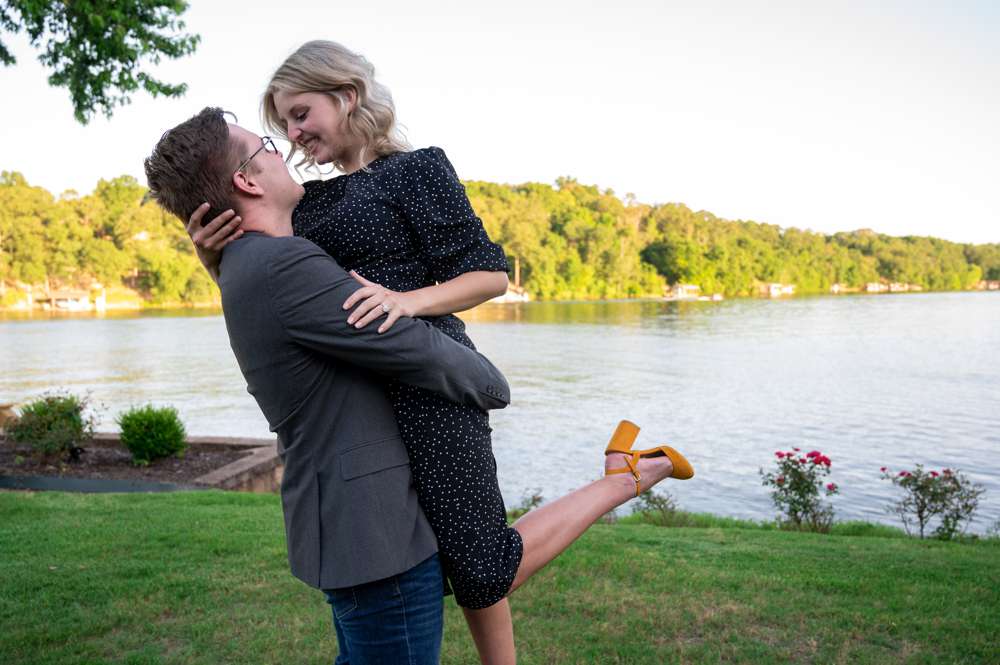 holding fiance up in the air
