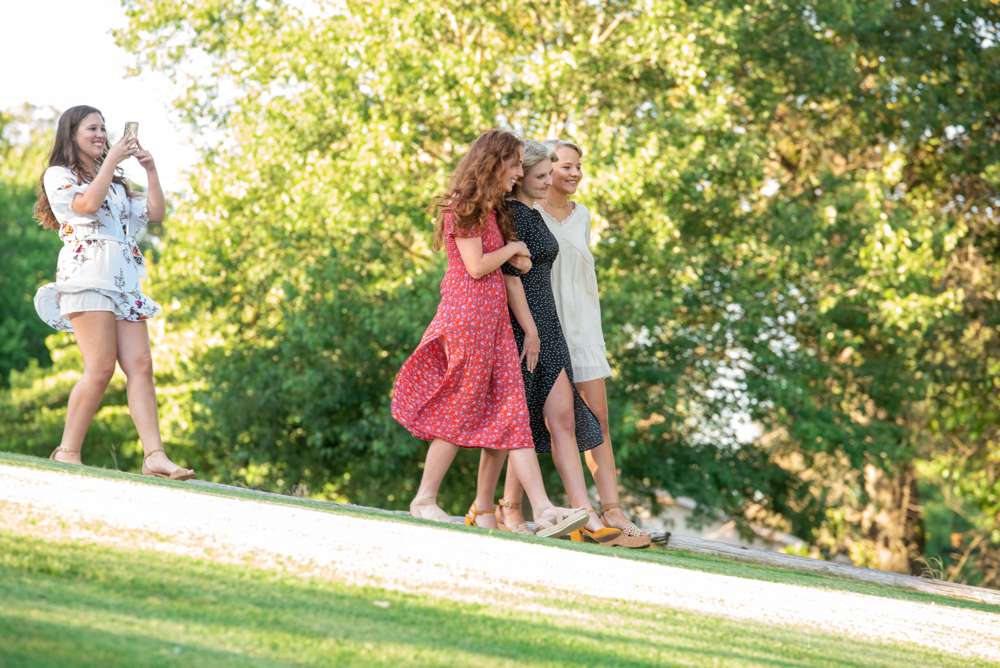 Group of friends with girl during proposal