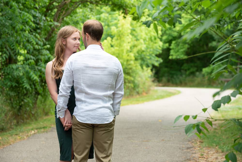 couple walking down a path