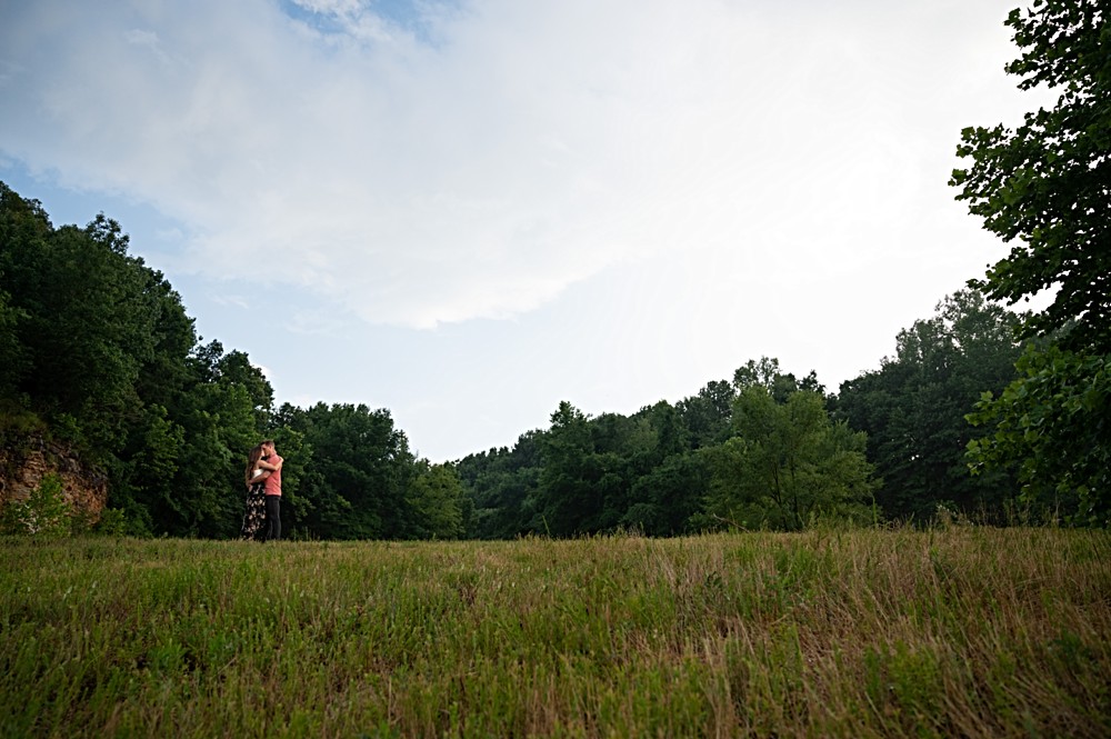 wide shot during engagement session with blue sky