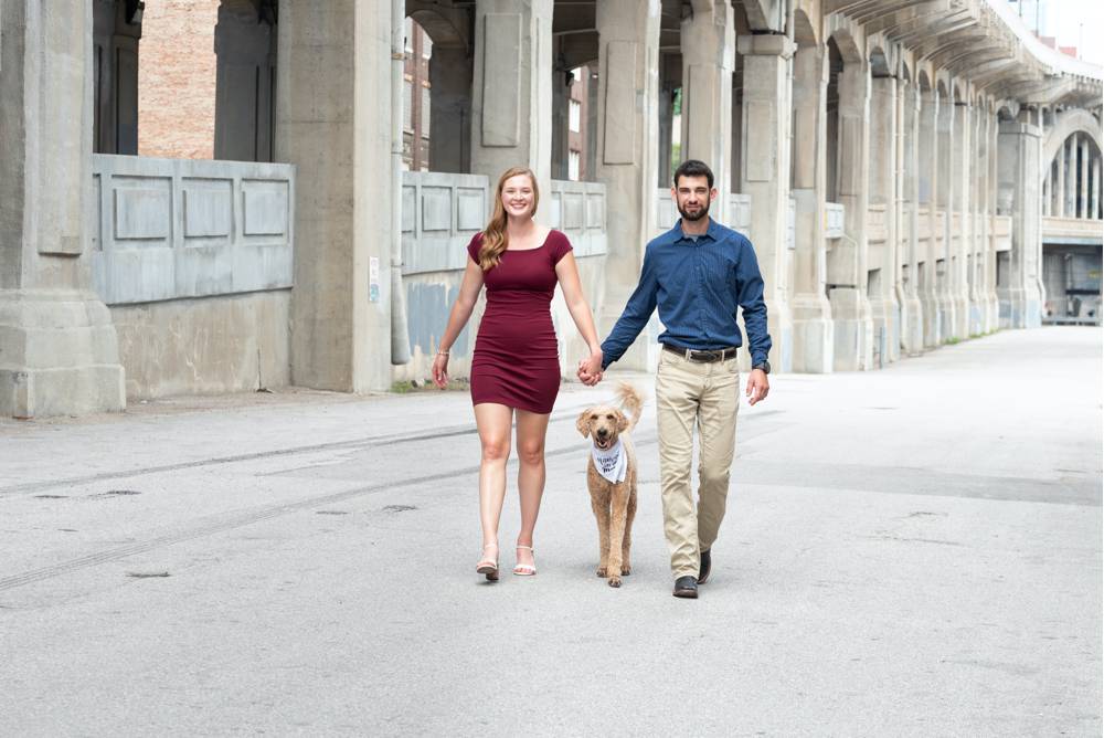 walking engagement photo with dog