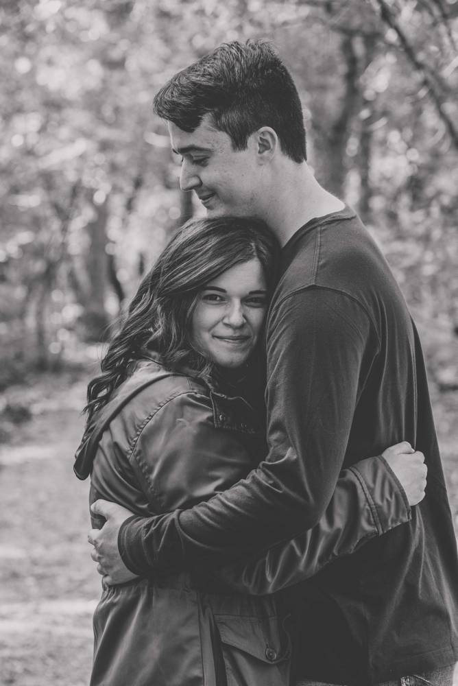black and white of couple hugging