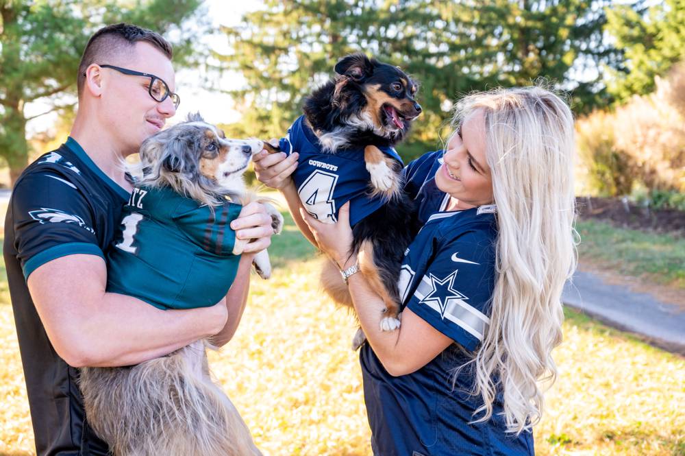 couple wearing football jerseys