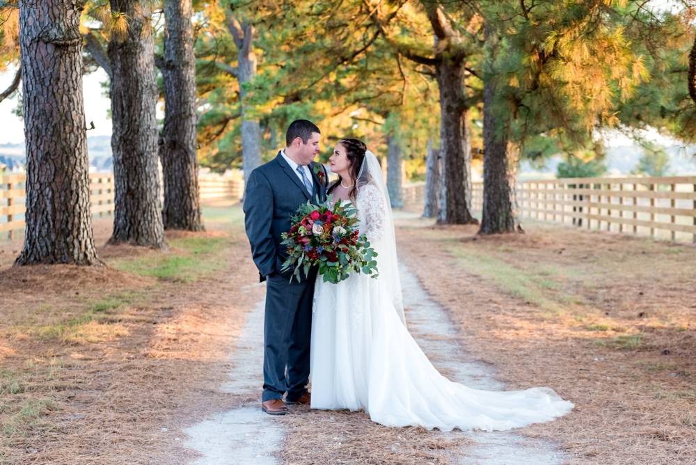 wedding couple in driveway of matt lane farm