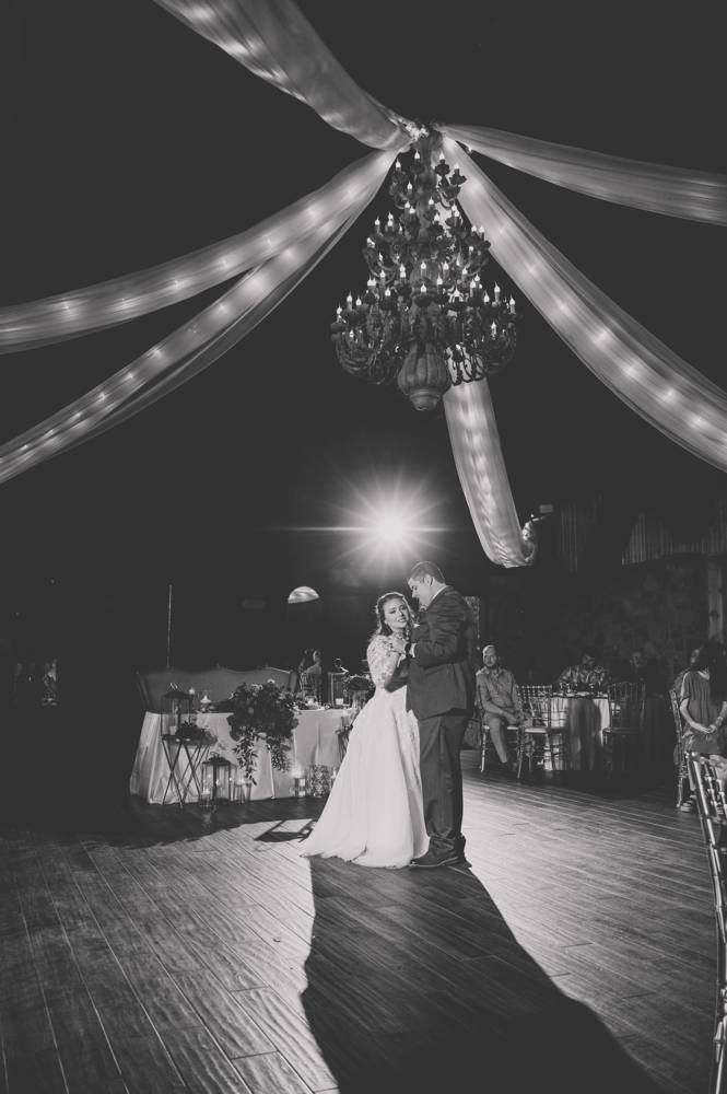 first dance with chandalier at Matt Lane Farm black and white