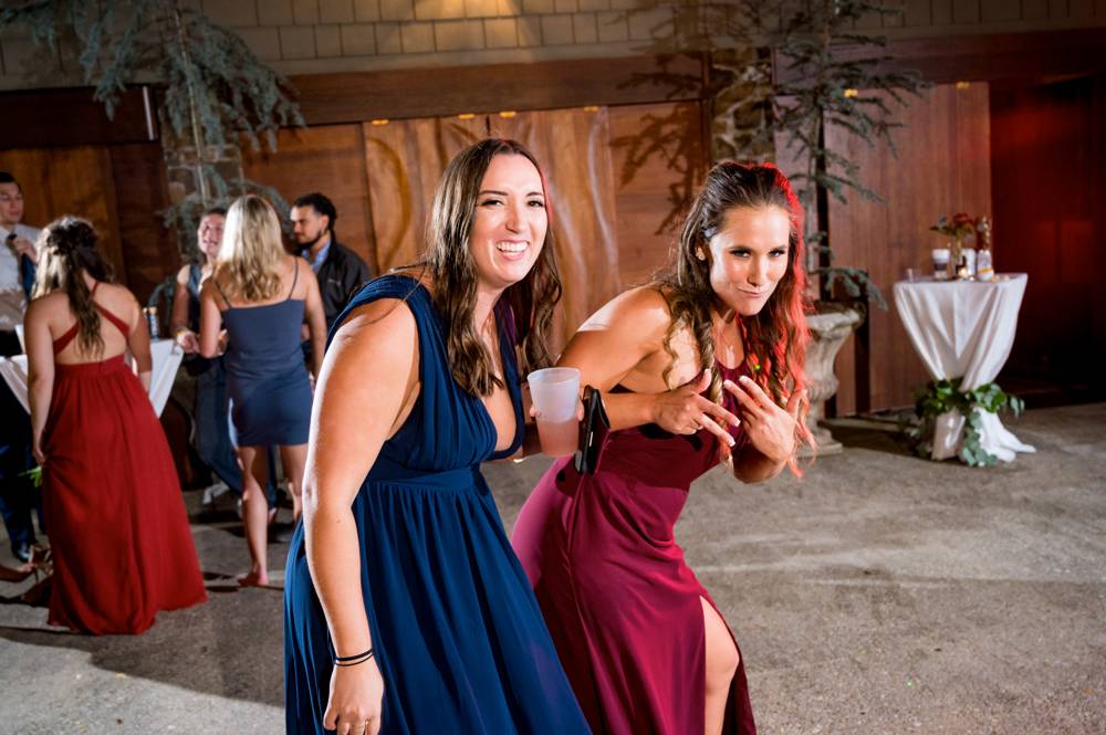 funny bridesmaid dancing at wedding reception