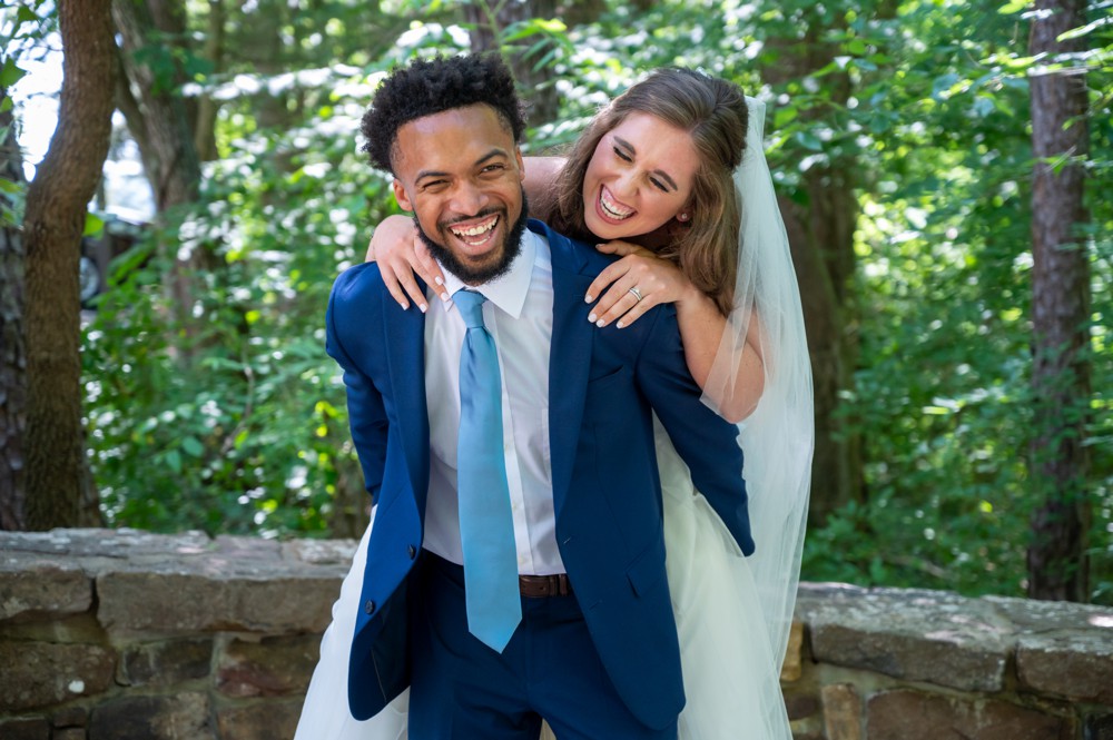 bride and groom laughing 