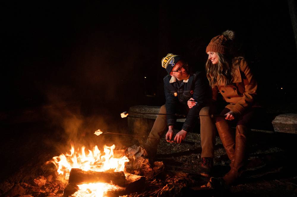 engagement photo in front of firepit