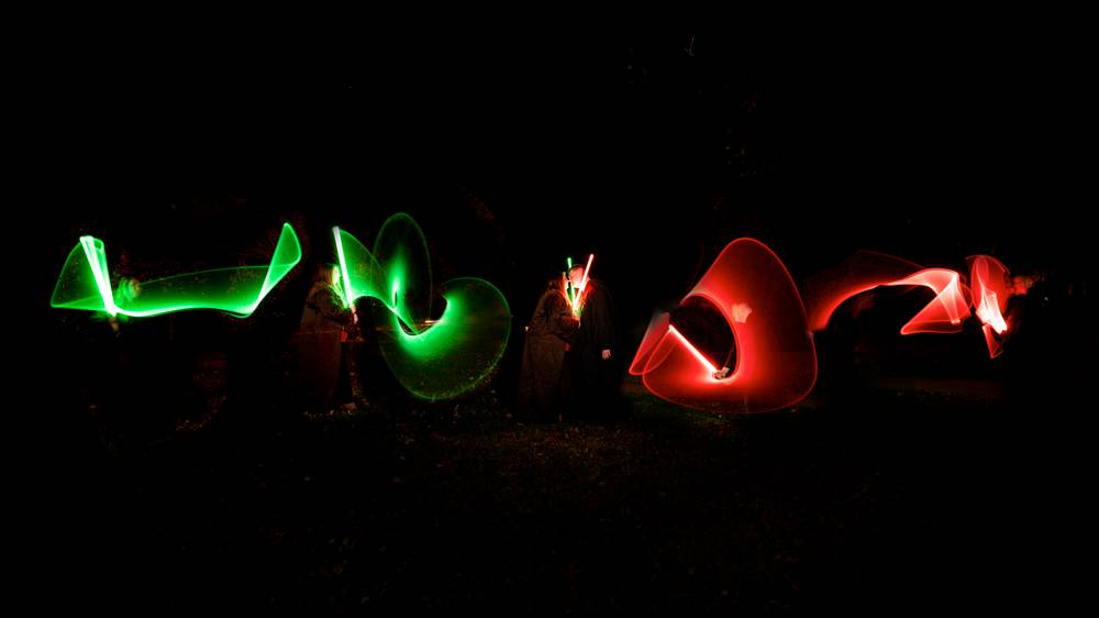 long exposure Star Wars light saber engagement photo