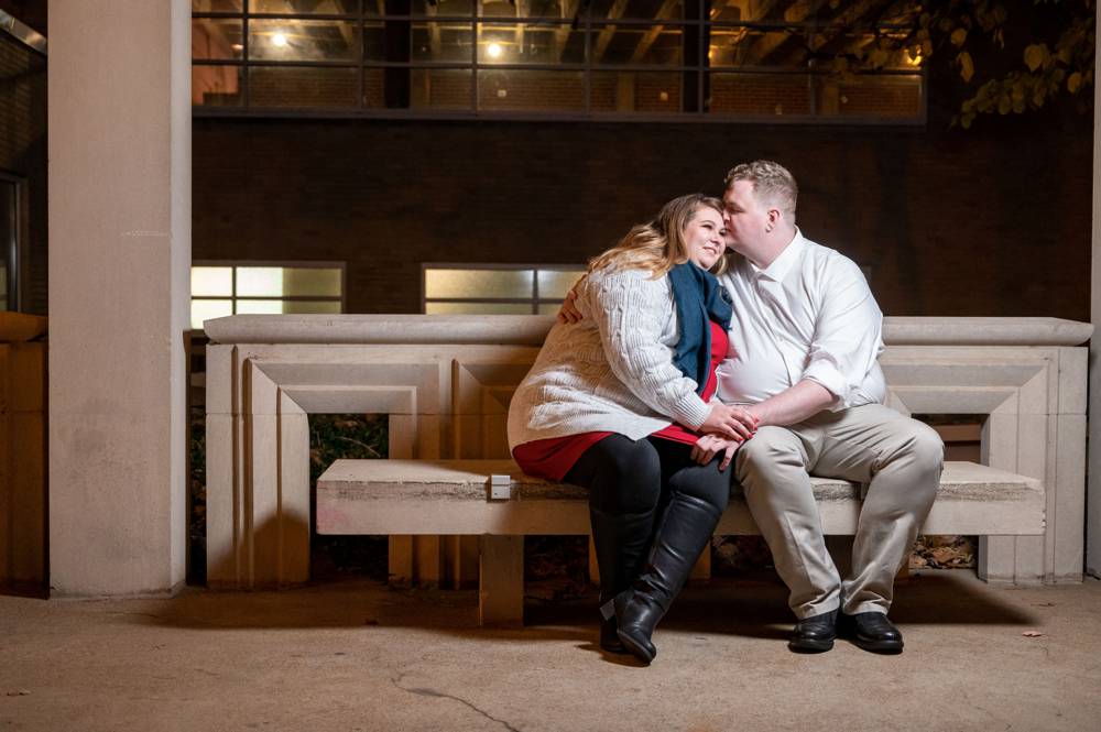 couple sitting on bench at the Muny