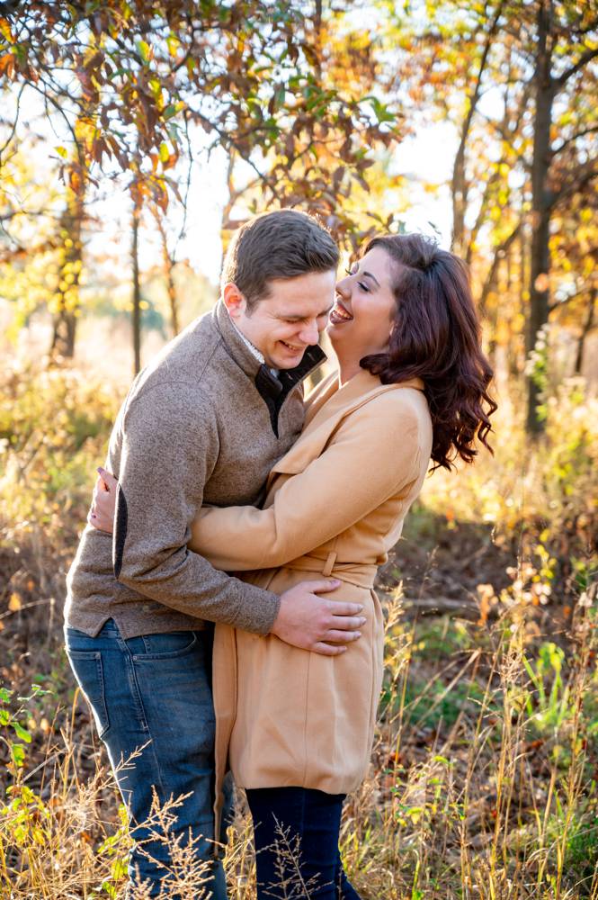 couple laughing while hugging
