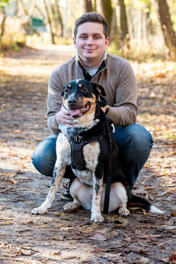 photo of guy with his favorite dog
