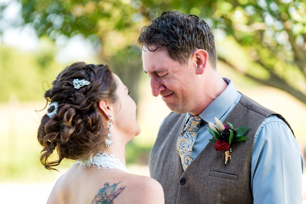 groom reaction and crying during first look