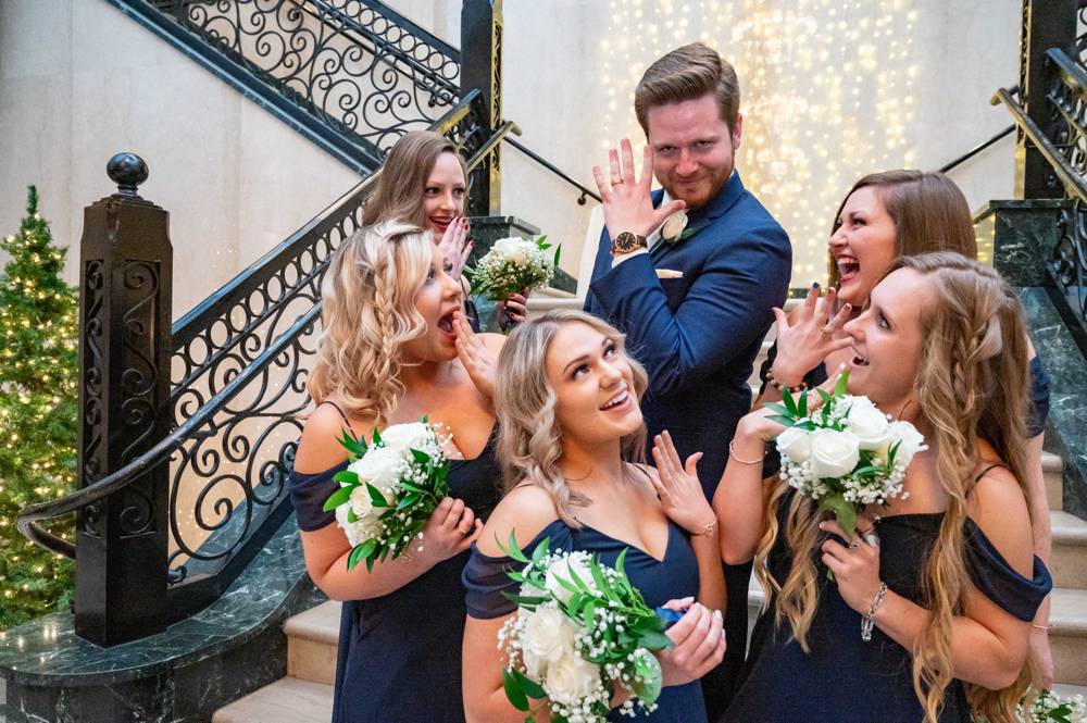 bridesmaids swooning over groom