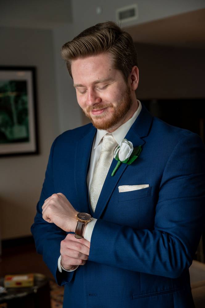 groom getting ready at Mayo Hotel in Tulsa
