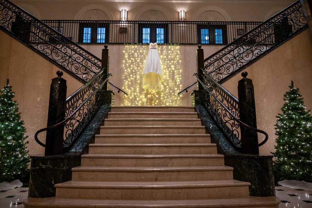 dress hanging on staircase at Mayo Hotel in Tulsa