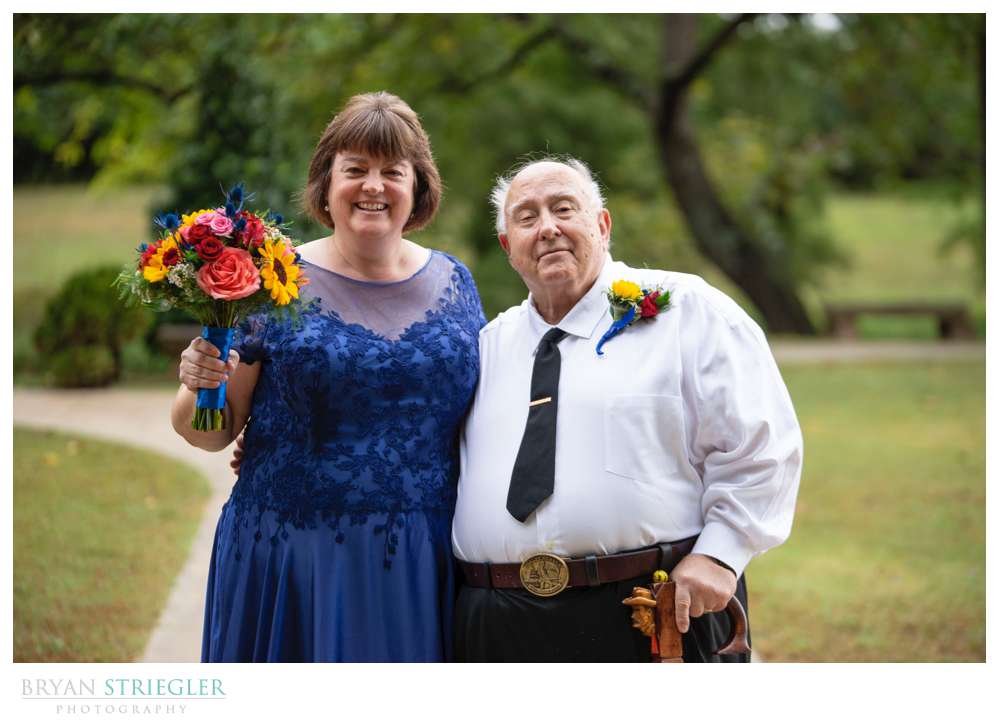 bride with father before wedding ceremony