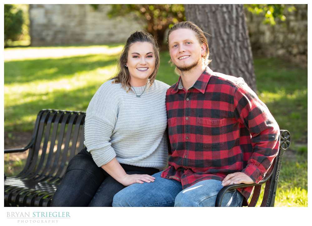 couple sitting on bench