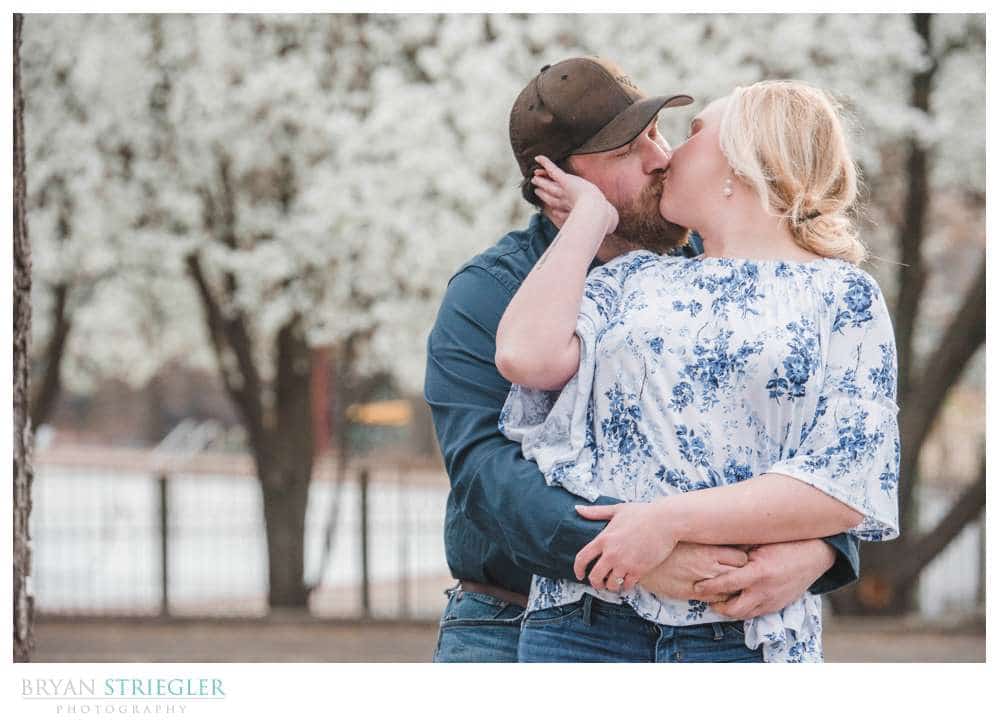 engagement photo with dogwood tree