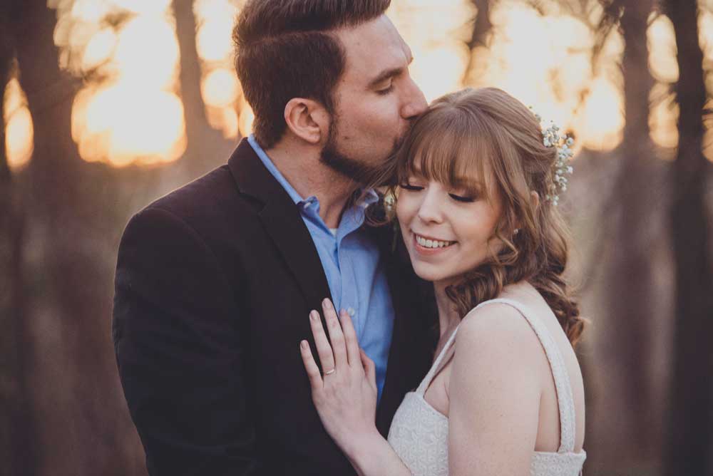 bride and groom with sunset at Mildred B. Cooper Chapel