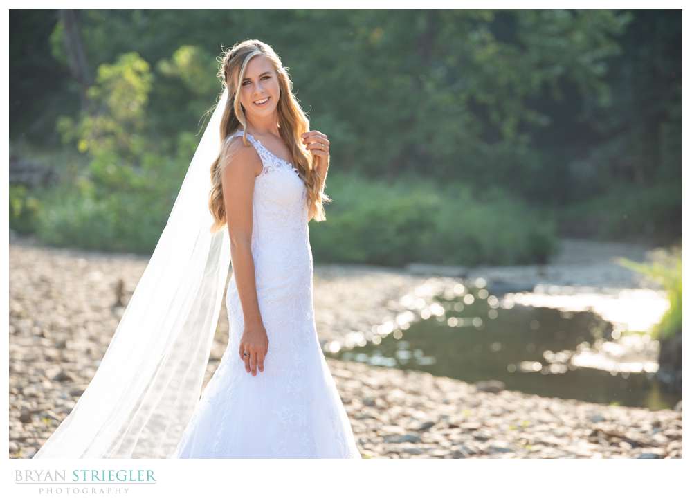 bridal portrait in creek