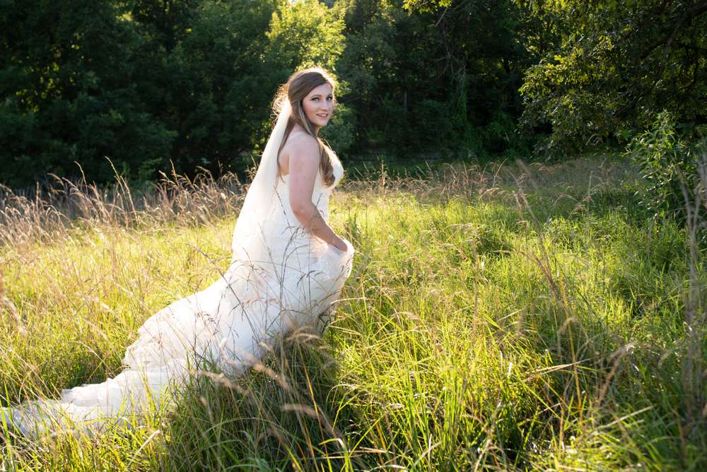 bride walking in high grass