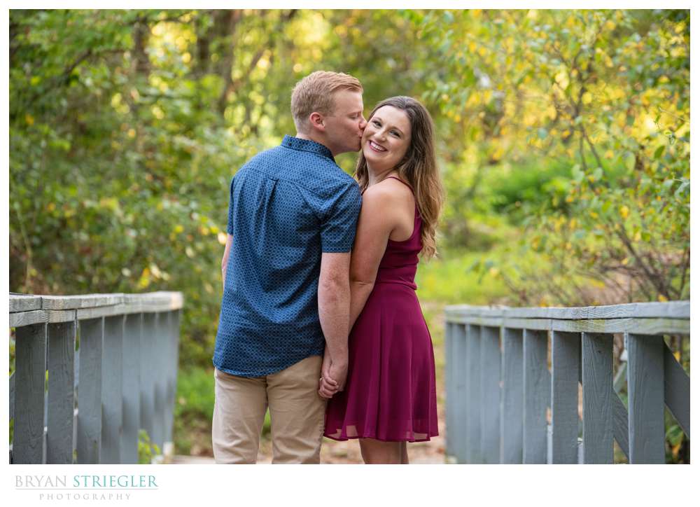 kissing on bridge