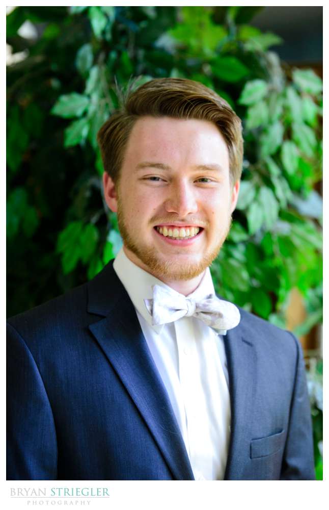 portrait of groom with window light