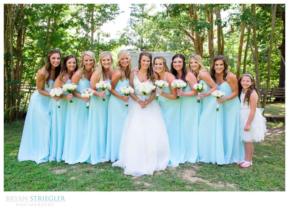 Bride and Bridesmaids hugging