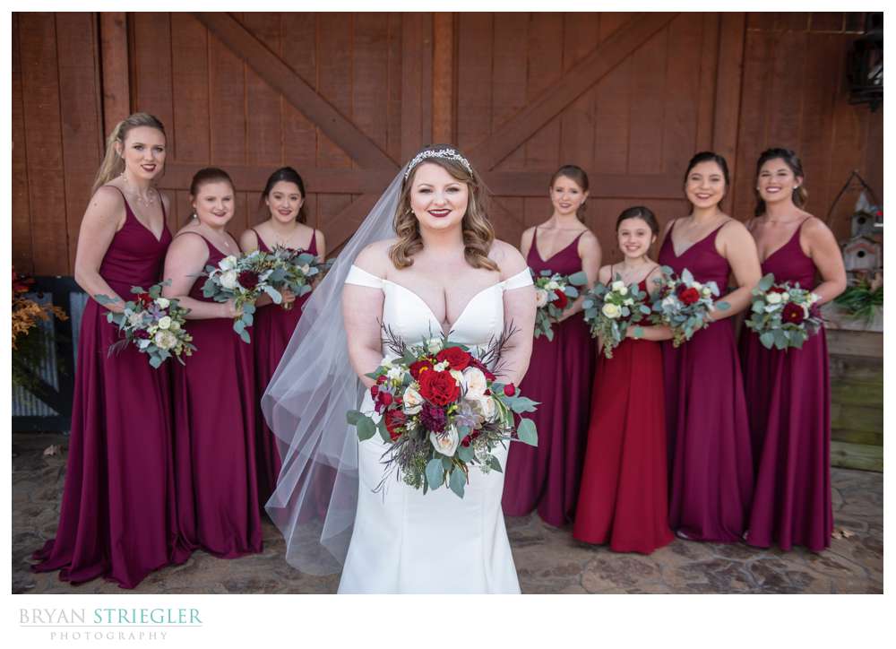 bride in front of bridesmaids