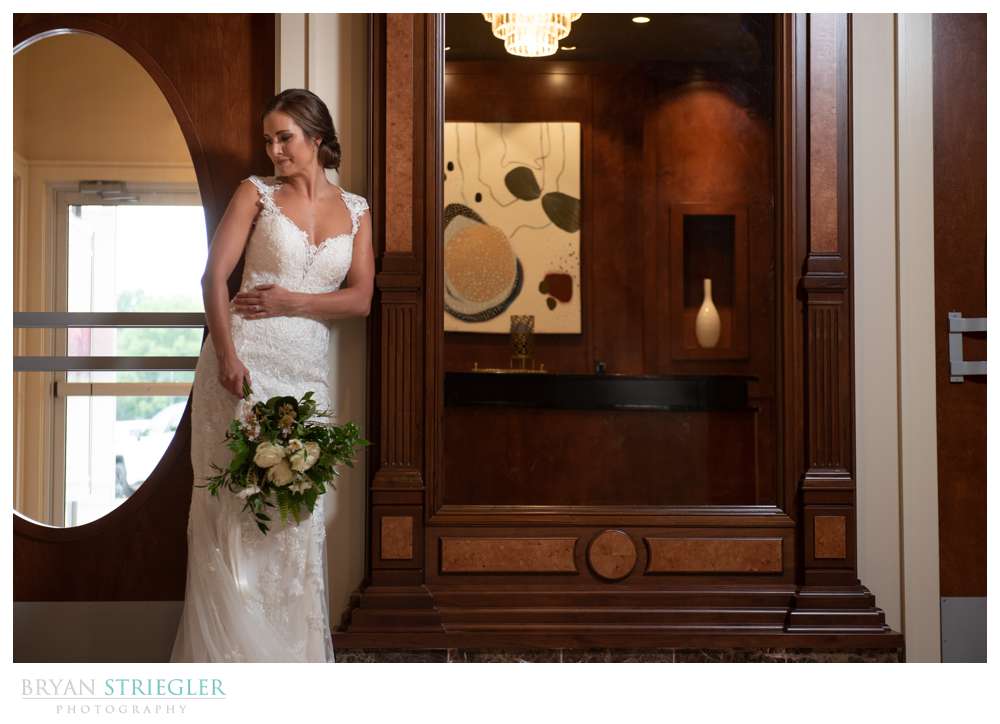 bride against mirror