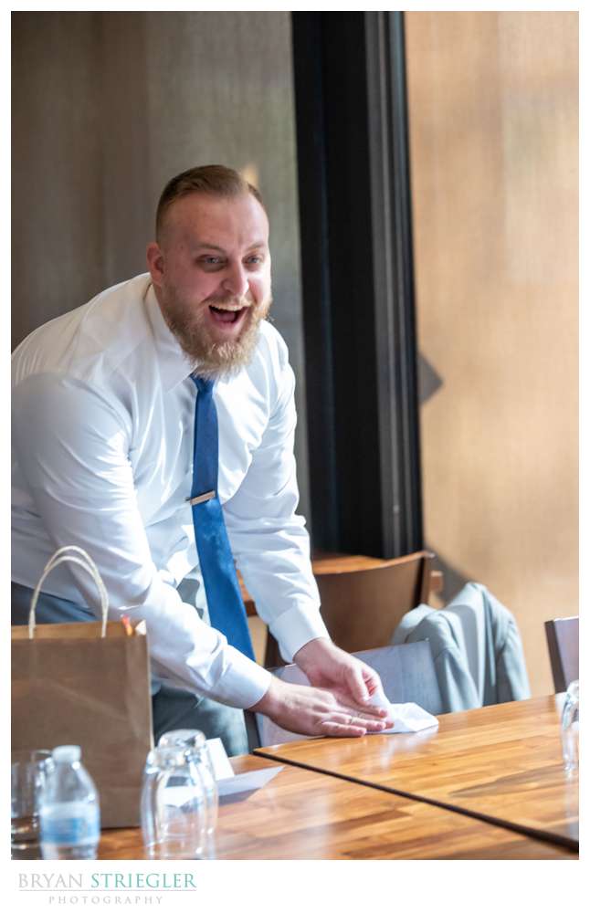laughing groomsman