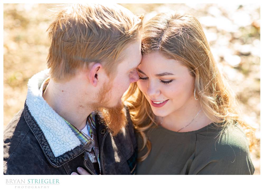 couple with heads together