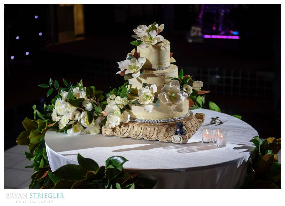 wedding cake with lots of flowers