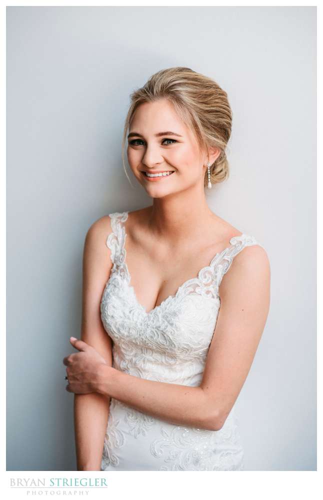 bridal portraits against a white wall